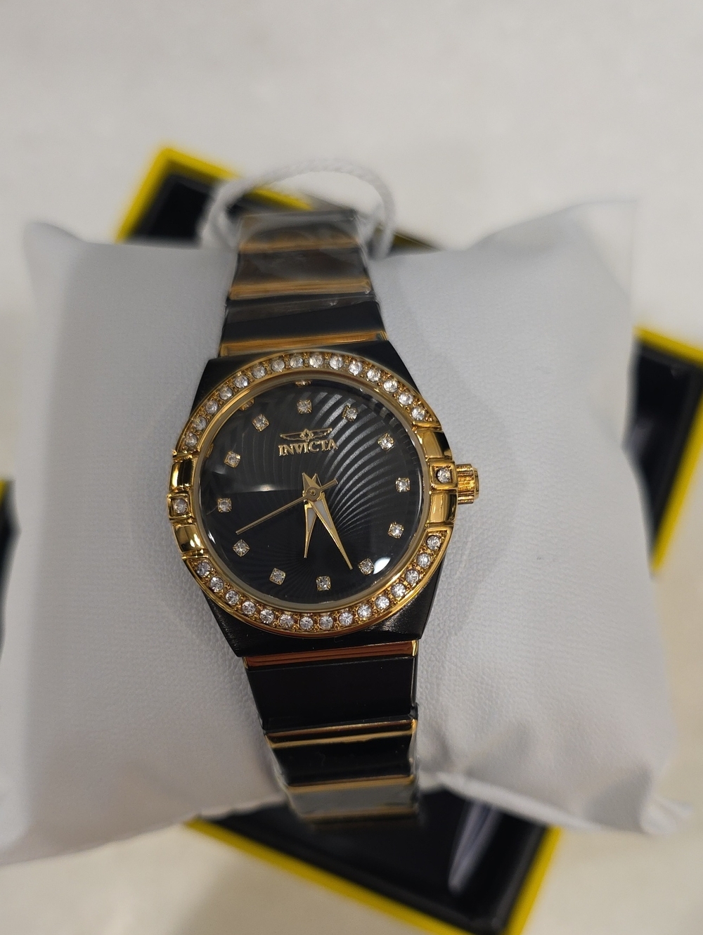 573.  Invicta Women’s Angel 28mm Two-Tone Black & Gold Quartz Watch (Model: 7026